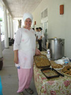 Amrit Kaur displaying the desserts